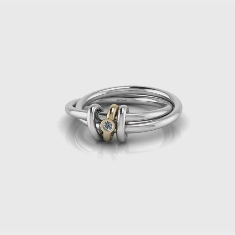 two silver bands mixed with yellow gold jump ring with diamond multi bands
