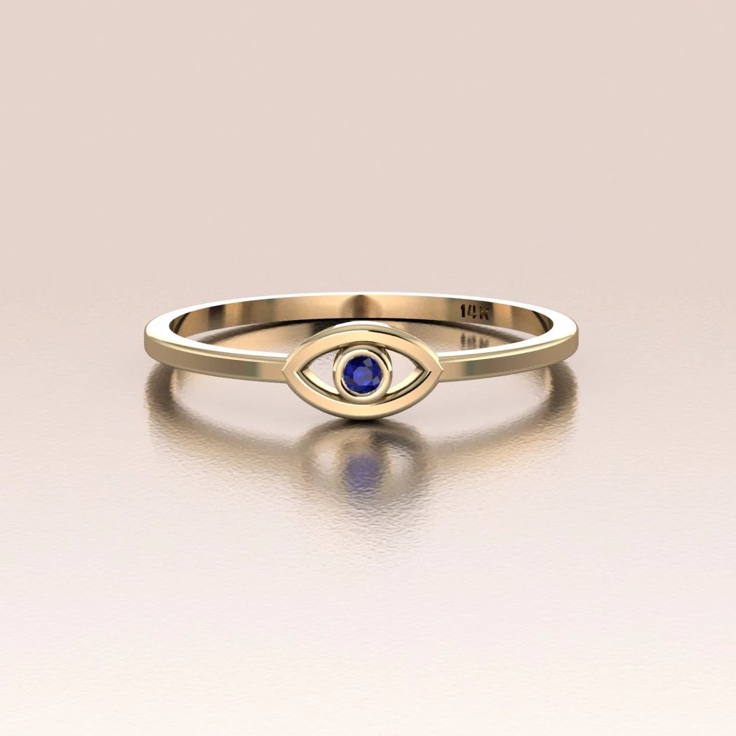 Sapphire evil eye ring discount