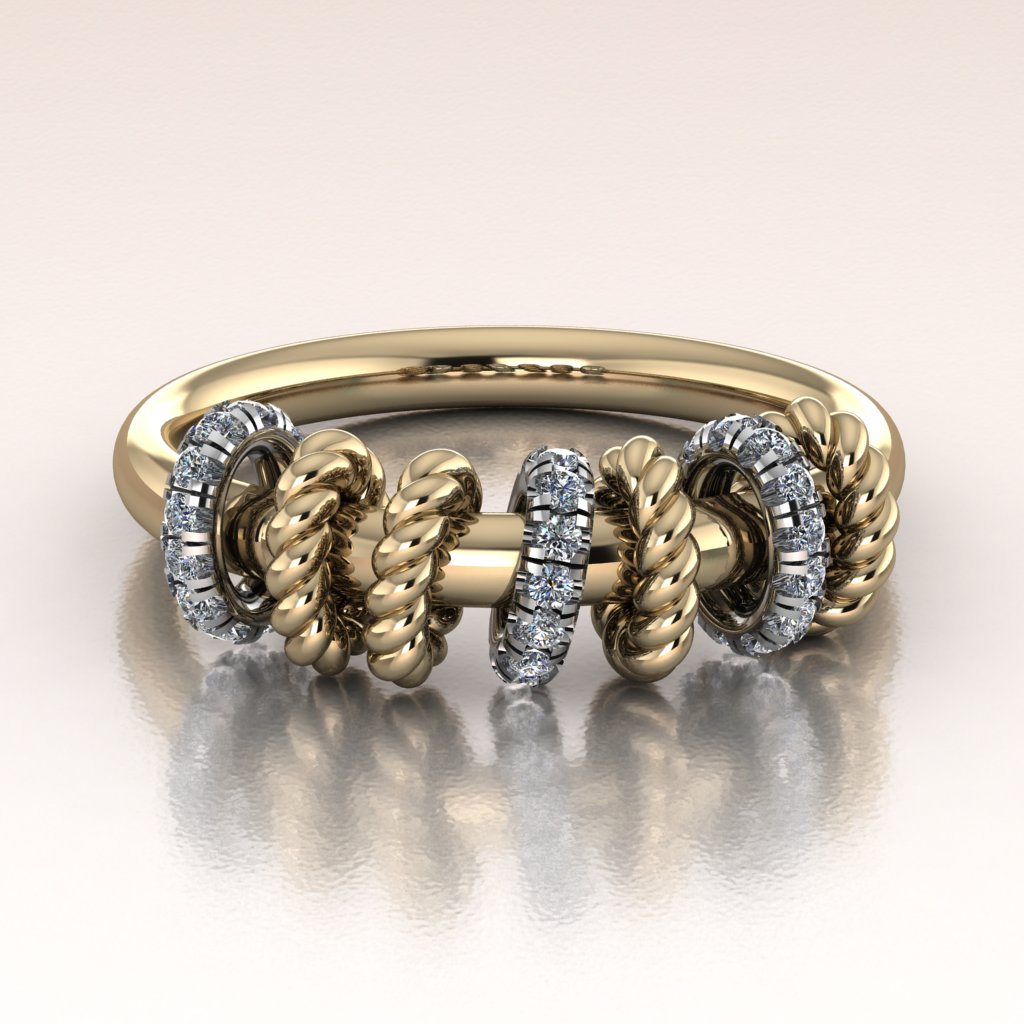 Gold ring with intricate twist rope design and moving diamond links on a light background