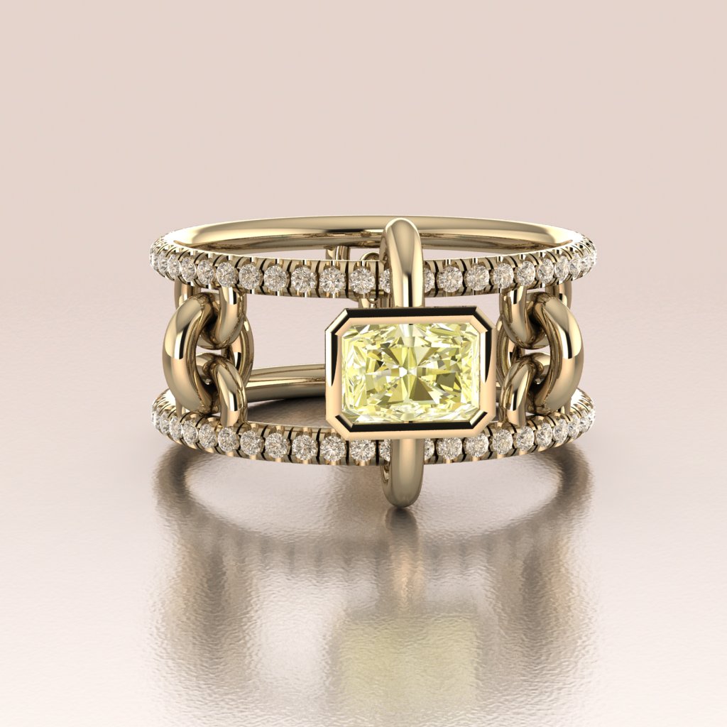 Gold ring with a yellow gemstone and diamond accents on a beige background