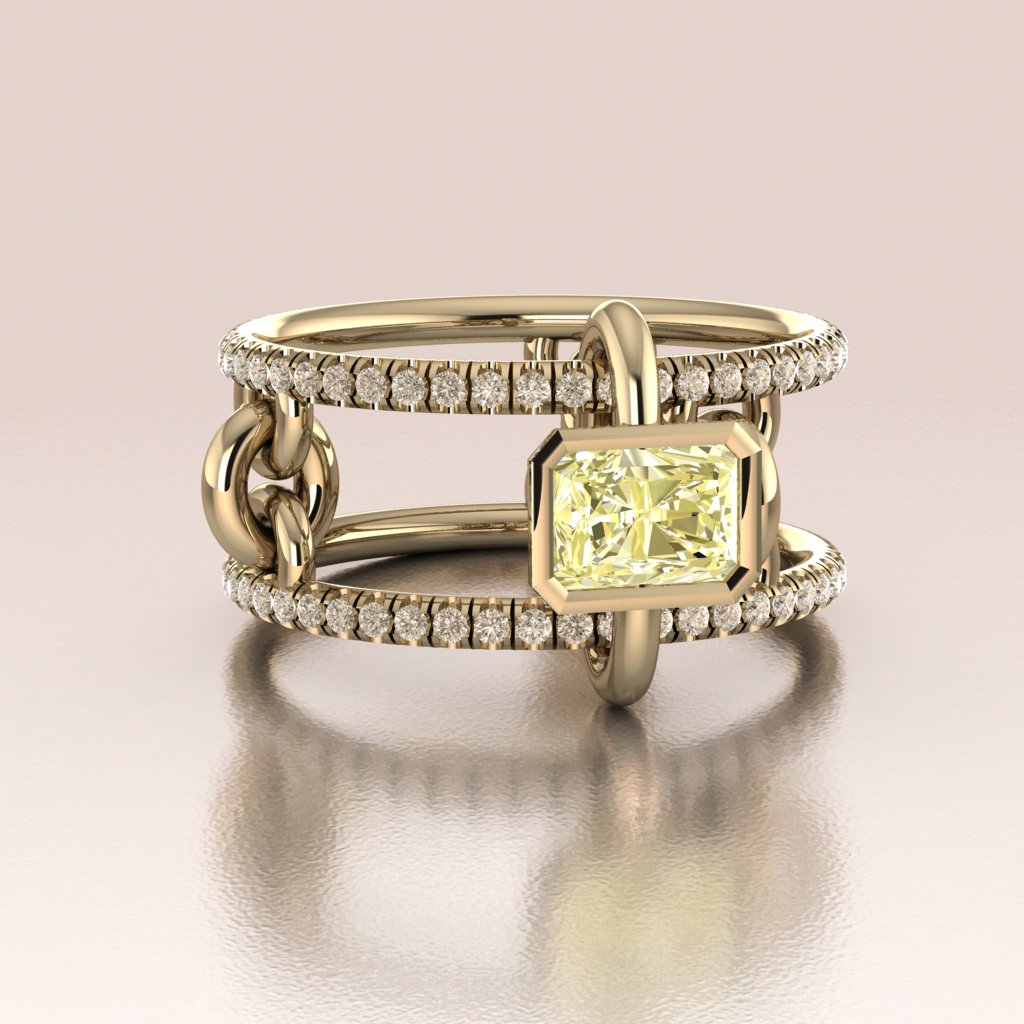 Gold ring with a yellow gemstone and diamond accents on a beige background