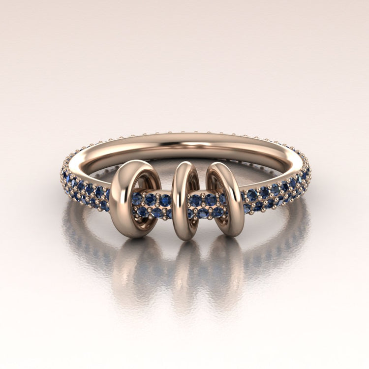 14k rose gold ring with double pave blue sapphires and moving links