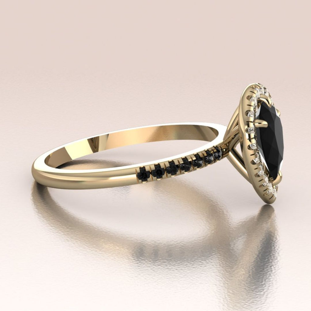 yellow gold pear black onyx engagement ring side view